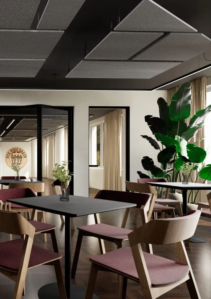 Clubrestaurant mit dunklen Tischen, altrosa Polsterstühlen und Akustikdecke